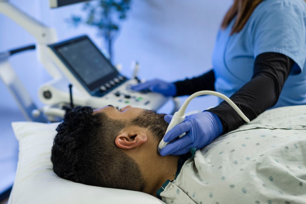 RVS Registered Vascular Sonographer photo of a person completing a diagnostic test during an education class to build her career in vascular technology